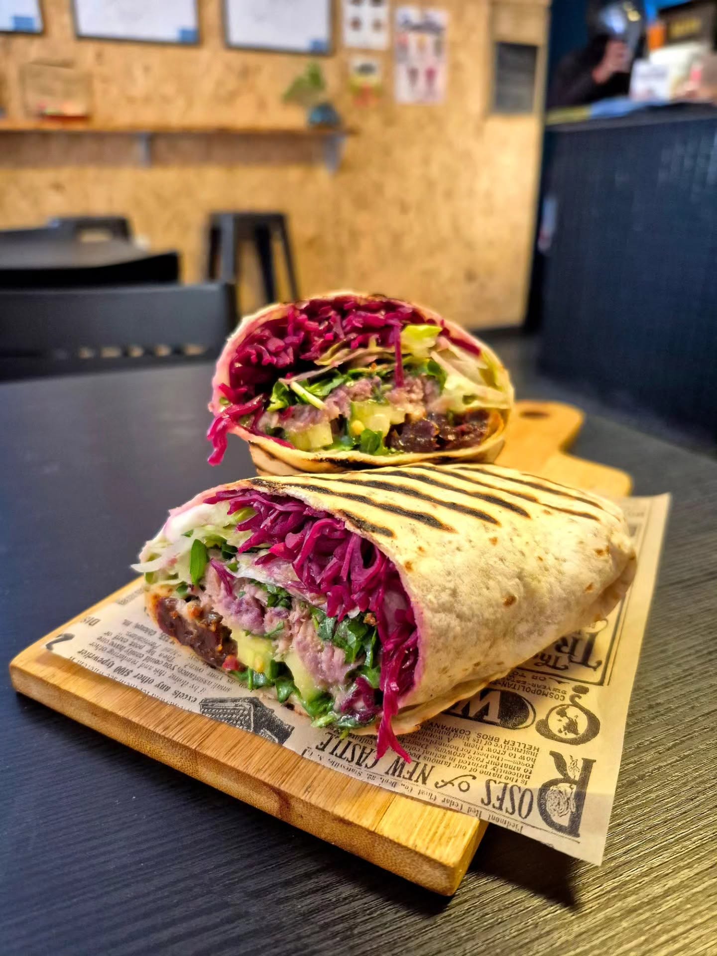 Fresh gourmet wrap filled with red cabbage and greens